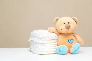 Imagem de urso e pilha de fraldas ganhados em chá de fraldas online