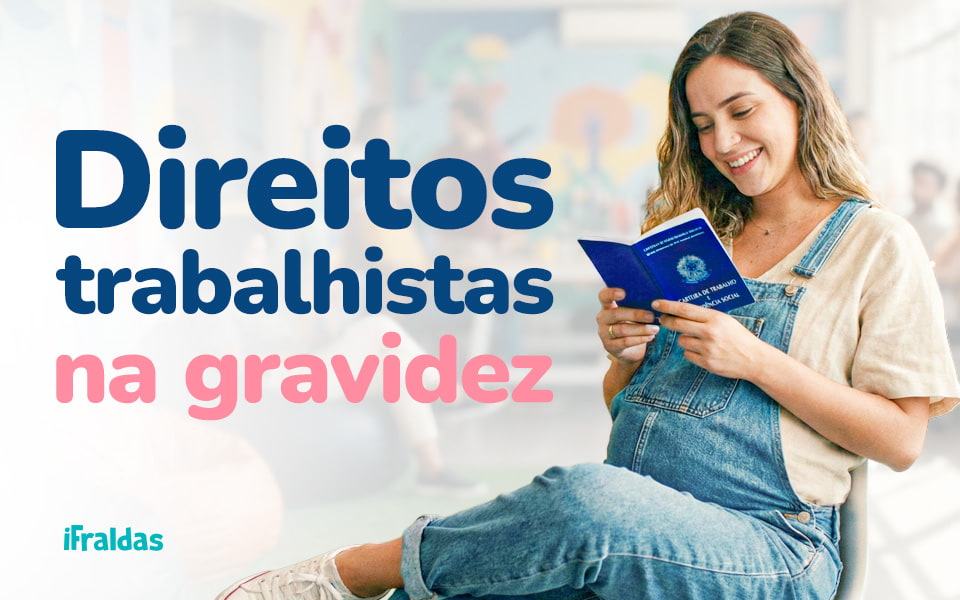Grávida segurando carteira de trabalho lendo sobre seu direitos trabalhistas na gravidez